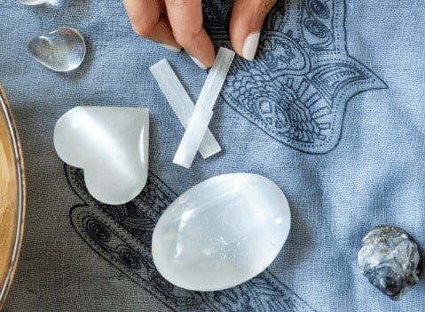 hand holding selenite