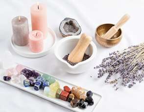 healing crystals herbs and candles for ambient setting