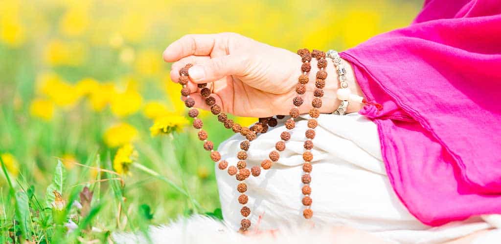 Praying and meditating with Mala beads