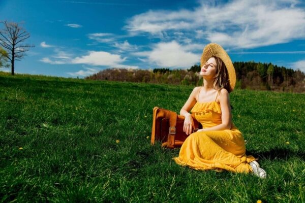 person out in sunshine unblocking their solar plexus chakra energy