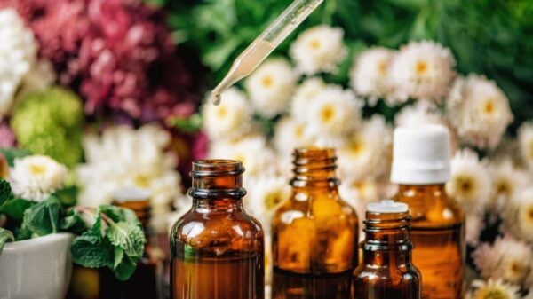 photo of bunch of flowers and dropper and essence bottles