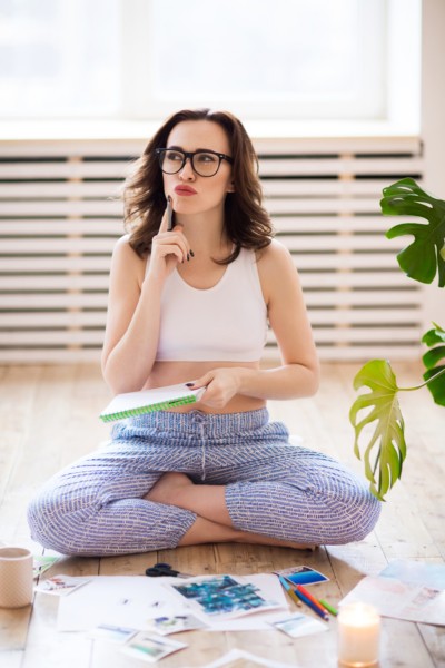 person sitting thinking what is the What is the difference between intentions and manifestation?